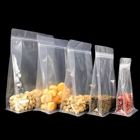 Pochettes de sacs d'emballage alimentaire refermables à fermeture éclair en plastique avec poignée en plastique à fond plat Transparent transparent